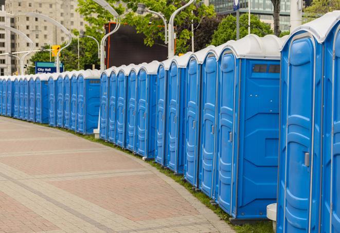 a line of portable restrooms at an outdoor wedding, catering to guests with style and comfort in Downey